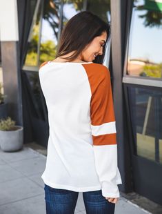 Step up your game with these varsity-style tops! These are super fun to dress up for your favorite team and are a stylish way to attend all those pre-game activities. Whether you choose to wear these for special sporting events or just because these won't be going out of style anytime soon! Size Small 0-4 Medium 6-8 Large 10-12 XL 12-14 Neutral T Shirts, White T Shirts, Maxi Skirt Dress, Color Block Top, Graphic Apparel, Home T Shirts, Knee Length Dresses, Knee Length Skirt, Romper Pants