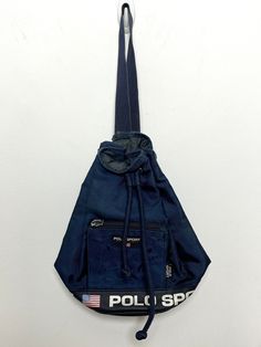 This bag is missing it's outer zipper pull tab, however the zipper itself is still functional. It also has some marks. (Please see photos for flaws) 12 inches x 13 inches Uni Bag, Ralph Lauren Vintage, Flag Logo, Sling Bags, Polo Sport, Sport Bag, Pull Tab, Cross Body Handbags, Purses And Handbags