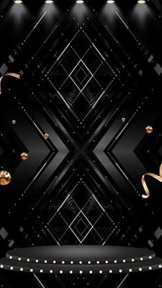 an abstract black and gold background with lights