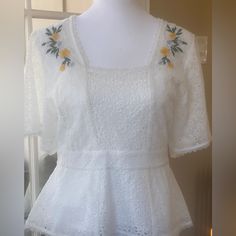 This Pretty French Connection Lace Top In White Makes A Feminine Statement Of Style. Yellow Flowers Are Embroidered Along The Sides Of A Square Neckline Back Zip Cotton Self Lined White Wrap Blouse, Red Stripes Top, Striped Off Shoulder Top, Floral Wrap Top, Tan Blouse, White Lace Blouse, Embellished Blouse, Bow Blouse, Leopard Print Blouse