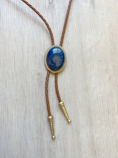 Southwestern Blue Agate Bolo Tie Gifts for Him Cabochon Gold Leather Cowboy Necktie Accessories Mens Necklace Bola Leather Cord Brown - Etsy Western Style Gold Lariat Jewelry, Elegant Blue Concho Jewelry, Elegant Blue Jewelry With Concho Detail, Concho Jewelry For Rodeo, Adjustable Concho Jewelry For Rodeo, Western Style Concho Jewelry For Gift, Western Style Concho Jewelry As Gift, Adjustable Gold Concho Jewelry, Vintage Formal Jewelry With Adjustable Length