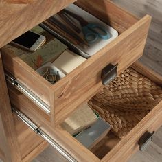 an open drawer with various items inside it