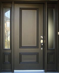 a brown front door with two sidelights