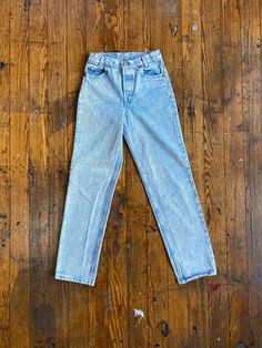 | Measurements & Condition | Waist: 24 inches Hips: 34 inches Inseam: 29 inches Front Rise: 10.25 inches Back Rise: 13.25 inches *These jeans have normal vintage wear with a couple minor discolored/stain spots but overall they are in good vintage condition. (Please refer to all pictures for condition) Levi's originally created the Women's 701 to distinguish between the mens 501. *Clothes are measured laying flat on the ground. The tag measurements are often different than the current measure Vintage Mid-rise Everyday Bottoms, Vintage Style Mid-rise Everyday Bottoms, Vintage Relaxed Fit Jeans For Everyday, Vintage Relaxed Fit Bottoms For Everyday, High Rise Vintage Bottoms For Everyday, Vintage Acid Wash Cotton Bottoms, Vintage Cotton Jeans For Everyday, Everyday Vintage Cotton Jeans, Acid Wash Retro Straight Leg Bottoms