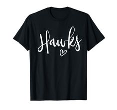 PRICES MAY VARY. If you've got school spirit for your high school team sports and your son, daughter, or boyfriend plays for the Hawks then this cute Hawks mascot design is for you. This cute hawks fan design shows: Hawks, in cursive with a cute heart Perfect gift for a mom or girlfriend that loves watching hawks football, hawks basketball, hawks baseball or any local school sports. Lightweight, Classic fit, Double-needle sleeve and bottom hem School Team Shirts, High School Mascots, Womens Football Shirts, Sports Mom Shirts, Raiders Football, Raiders Fans, Team Mascots, In Cursive, Spirit Shirts