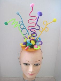 * This is a simple festive headpiece that would be perfect for that fun seeking gal who loves to party or for a birthday celebration or a kid's playday.   *  This design features Five (5) different colors curled acrylic tubes each with it's own pom pom.  The base of the design is covered in the various colors of pom poms and acrylic oblong forms all for that party feel. *   It's well balanced and comfortable and made to sit directly on top of the head and will fit just about any head size.  It i Pom Pom Hats, Spongebob Musical, Junk Kouture, Festival Headpiece, Floral Headdress, Clown Horror, Crazy Hat Day, Unicorn Fashion, Headpiece Diy