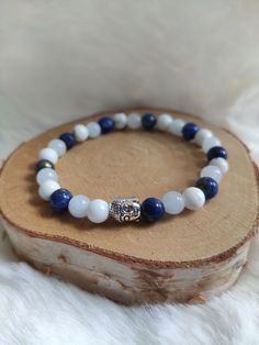 Soothing and relaxation bracelet Three natural stones: 🍃 lapis lazuli frontal chakra relaxation and letting go 🍃 White Howlite crown chakra soothing and protection of the immune system 🍃 aquamarine throat chakra expression, clarity and softness Other items available https://www.etsy.com/fr/shop/LesBijouxdOH Holistic Blue Beaded Bracelets For Meditation, Spiritual Blue Beaded Bracelets For Meditation, Blue Natural Stones Beaded Bracelets For Meditation, Holistic Blue Beaded Bracelets For Healing, Blue Crystal Bracelet For Meditation, Blue Hand-strung Crystal Bracelet For Meditation, Blue Crystal Bracelet With 8mm Beads For Meditation, Blue Lapis Lazuli Spiritual Bracelet, Blue Lapis Lazuli Spiritual Crystal Bracelet