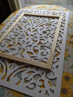 the cut outs are being used to make a decorative wall panel