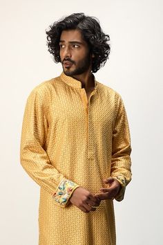 Yellow long kurta with thread embroidery all over and printed cuffs. Paired with a white dhoti pant. - Aza Fashions Long Sleeve Kurta With Embroidered Cuffs For Eid, Designer Long Sleeve Kurta With Embroidered Cuffs, Festive Cotton Kurta With Embroidered Cuffs, Traditional Wedding Kurta With Embroidered Cuffs, Traditional Straight Kurta Set With Embroidered Cuffs, Traditional Set With Straight Kurta And Embroidered Cuffs, Eid Long Sleeve Kurta With Embroidered Cuffs, Traditional Set With Embroidered Cuffs And Straight Kurta, Festive Kurta With Embroidered Cuffs