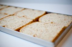 several slices of bread in a metal pan