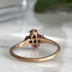 Details: Super sweet Victorian ring with diamond and pink/red rubies. The setting reminds me of flower. The ring is 14K rose gold, and has been tested. There are no markings on the interior of the band. There are four 3.25mm rubies and one 2mm diamond. Please ask all necessary questions prior to placing an order. Measurements: The size is 7 1/4 US and can be sized for a fee. Condition: The overall all condition of this ring is very good. Jelly Opal, Filigree Ring Gold, Victorian Ring, Cameo Ring, Victorian Rings, Ring With Diamond, 14k Rose Gold Ring, Gold Engraving, Red Band