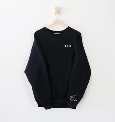 This custom dad sweater is the perfect gift for Father's Day! Personalized with the kids names this makes the perfect gift for a new dad, papa, grandfather, husband or any daddy in your life!   T H E   F I T  *Our Unisex Sweaters are a customer favourite - Gildan Brand made from 50% cotton, 50% polyester, these sweaters fit roomy as they are unisex. P R O D U C T I O N  &  S H I P P I N G  *Every item purchased is made to order and heat pressed by a member of our shop, we require 3-5 business da Personalized Black Crew Neck Sweatshirt, Customizable Long Sleeve Sweatshirt For Father's Day, Family Matching Crew Neck Sweatshirt For Father's Day, Casual Father's Day Gift Sweatshirt, Father's Day Casual Sweatshirt Gift, Father's Day Crew Neck Sweatshirt As Gift, Father's Day Gift Crew Neck Sweatshirt, Father's Day Cotton Sweatshirt With Name Print, Black Crew Neck Sweatshirt For Birthday