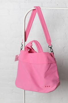 Carrie Catch All Shoulder Tote Bag - Fuchsia Versatile Everyday Pink Bag, Functional Pink Everyday Bags, Pink Nylon Gym Bag, Functional Pink Satchel Shoulder Bag, Functional Pink Shoulder Bag For Daily Use, Functional Pink Bag For Everyday Use, Sporty Pink Shoulder Bag For Daily Use, Casual Pink Softback Bag, Sporty Pink Bag For Sports