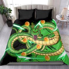 a bed with a green and yellow dragon on it