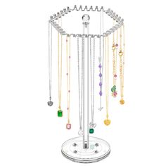 a jewelry stand with many different necklaces on it