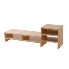 a wooden shelf with two open shelves on each side and one closed shelf at the top