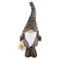 a stuffed toy gnome with an orange nose and white beard, holding a gold ornament