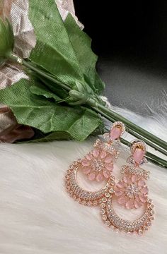 High End American Diamond (AD) style Medium Dangling Earring| Perfect for Wedding,Party wear | Indian, Pakistani,bridal jewelry. Mothers day gift. Medium Style AD Dangling Earrings. Material- American Diamond High End Quality 100% Satisfaction Guarantee: Long Lasting Plating, High-Quality Stones. Perfect for any occassion-Western, Indian and Casual day looks.    Colors Available- -Gold Mint -Gold Pink -Silver Pink -Silver Ruby - Silver Blue - Silver Black -Silver Mint Care: It is advisable that Luxury American Diamond Danglers For Receptions, Glamorous Wedding Flower Earrings For Pierced Ears, Round Flower Earrings For Wedding, Elegant Pink Earrings For Festive Occasions, Elegant Pink Cubic Zirconia Flower Earrings, Glamorous Hand Set Bridal Earrings For Wedding, Elegant Pink Drop Earrings Danglers, Elegant Pink Drop Danglers, Glamorous Hand Set Earrings For Wedding