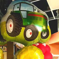 an inflatable vehicle with large tires on display