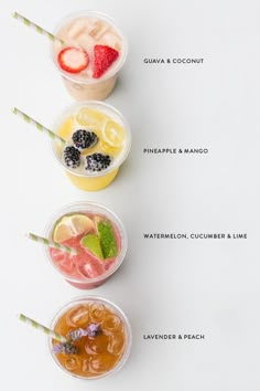 three cups with different types of drinks in them on a white surface, one has strawberries and the other has lemons