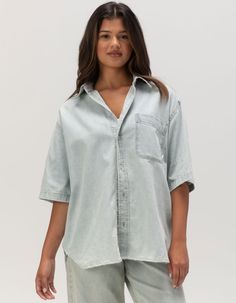 Thrills Darian Denim Shirt. Built To Endure Trends And Seasons, This Darian Denim Shirt In Dirty Fade Boasts A Timeless Appeal You Can Wear Year After Year. Perfect For Layering, It Features An Exaggerated Silhouette With A 90s-Style Baggy Fit With Extra Roomy Sleeves And Longer Hems. The Button-Down Front, Collar And Pocket Effortlessly Elevate The Look, While The Vintage Wash Highlights Your Authentic, Street Style. Regular Fit. 100% Organic Cotton. Machine Wash. Imported.model Is Wearing A Size Small. Model Measurements:height: 5'8" Bust: 33"waist: 24"hips: 36" Relaxed Fit Light Indigo Button-up Top, Light Indigo Relaxed Fit Button-up Top, Casual Light Indigo Tops With Relaxed Fit, Relaxed Fit Chambray Denim Top With Collar, Relaxed Fit Short Sleeve Chambray Denim Top, Relaxed Fit Chambray Denim Top With Short Sleeves, Relaxed Chambray Denim Top With Short Sleeves, Light Indigo Washed Shirt With Relaxed Fit, Relaxed Fit Washed Blue Chambray Top