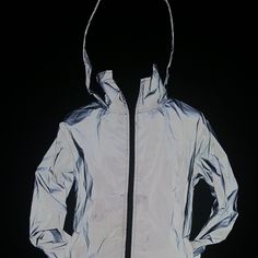 Completely Waterproof Light Weight Windbreaker 3m Jacket Perfect Jacket For Runners / Walking Women Size Small Available Women Measurements Small- Pit To Pit 20.5in Length 26.5in Medium- Pit To To Pit 21in Length 27in Fully Reflective Jacket For Many Occasions Without Flash The Jacket Is Gray. You Can Use A Sharpie To Add A Design. Design Stands Out With Flash Photo Shown Is How Jacket Looks When Taken With Flash And Without Water Is Not Absorb It I’ll Just Roll Off. Perfect For All Weather Cond Functional Reflective Winter Outerwear, Sporty Reflective Winter Outerwear, Sporty Reflective Outerwear For Winter, Reflective Winter Outerwear For Outdoor, Reflective Hooded Nylon Outerwear, Reflective Long Sleeve Winter Windbreaker, Winter Reflective Long Sleeve Windbreaker, Reflective Casual Winter Outerwear, Casual Reflective Winter Outerwear