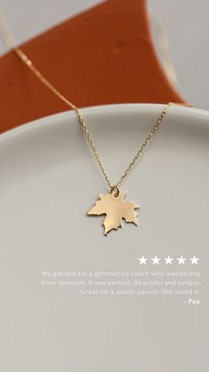 GELIN Diamond Maple Leaf Necklace review with text - "We got this for a gymnastics coach who was retiring from Vermont. It was perfect. Beautiful and simple. Great for a sports persom. She loved it. -Pep" Sterling Silver Leaf-shaped Jewelry In Yellow Gold, Leaf-shaped Yellow Gold Necklace For Gift, Leaf-shaped Yellow Gold Necklace, Yellow Gold Leaf Necklace As Gift, Yellow Gold Leaf Necklace For Gift, Yellow Gold Leaf Shape Nature-inspired Jewelry, Yellow Gold Leaf-shaped Jewelry Gift, 14k Yellow Gold Leaf-shaped Jewelry, Minimalist Yellow Gold Leaf Jewelry