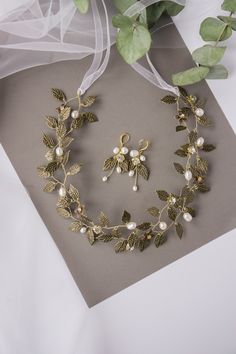 *This bohemian hair vine made with about 50 small brass leaves, to a flexible brass headband that sits securely and comfortably on your head while you celebrate and dance the night away on your wedding day! * Hair vine measures    about 2.7 inches (7 cm) (at its widest part)   length 35 cm ( 13.7 inches ) * Earrings measures     about 4 cm * 2 cm (1.5 *0.7 inches) * Groom's brooch measures     about 5 cm * 2.5 cm (1.9 *0.9 inches) * Flexible and bendable. * The bridal headpiece will be packed in a gift box! * Hand made in our studio. *More brass crowns* https://www.etsy.com/listing/761959939/brass-floral-bridal-tiara-wedding-crown?ga_order=most_relevant&ga_search_type=all&ga_view_type=gallery&ga_search_query=brass+floral+hair+vine&ref=sr_gallery-1-3&organic_search_click=1&pro=1 Custom orde Gold Wedding Headpiece For Spring, Fitted Vintage Gold Headpiece, Bohemian Gold Crown Headpiece, Whimsical Gold Wedding Headpiece, Gold Floral Hair Piece, Floral Hair Vine, Brass Crown, Art Nouveau Weddings, Pearl Hair Vine