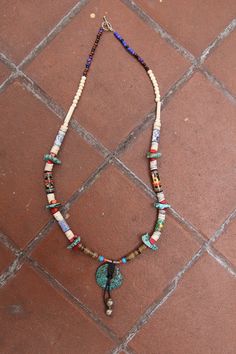 Handmade Native American Necklace with Spider Web Turquoise Circle Pendant, Sleeping Beauty Turquoise, Trade Beads, Boho Chic, Tribal Style  Tribal jewelry (ethnic jewelry) – is one of the most beautiful, unusual and original for every race and nation. After all, it is like a native home, place or people – these jewelry give us a peace of mind and pacification; and if you are even a patriot – it helps to express yourself, to stand out from the crowd and to feel comfortable (in fact most comf... Found Object Jewelry Native American, Bohemian Turquoise Necklace With Colorful Round Beads, Spiritual Turquoise Necklace With Round Beads For Festivals, Bohemian Turquoise Beaded Necklaces, Bohemian Hand-strung Beaded Necklaces, Bohemian Beaded Necklace With Polished Round Beads, Bohemian Turquoise Beaded Necklace, Bohemian Round Beaded Necklace With Polished Beads, Bohemian Polished Round Beaded Necklace