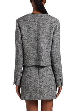 Inspired by everyday glamour in the City of Lights, this cropped cotton-bouclé jacket beautifully marries Parisian elegance and quality Italian craftsmanship. Front button closure Jewel neck Front flap pockets Lined 60% cotton, 20% polyester, 10% viscose, 10% acrylic Machine wash, line dry Made in Italy Designer Clothing Elegant Cropped Tweed Outerwear, Elegant Cropped Tweed Jacket For Formal Occasions, Elegant Cropped Fitted Tweed Jacket, Elegant Fitted Tweed Cropped Jacket, Parisian Elegance, City Of Lights, Boucle Jacket, Italian Craftsmanship, Golden Goose Deluxe Brand