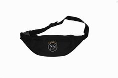 Limited edition #TrustsNo1 Heritage Waist Bag In black The trademark signature TRUSTS NO.1 badge logo is embroidered on the front of the bag in white, metallic gold & white. Crafted for the street-wise individual, self-aware & diligent about whom they trust. It can be bought as a gift for someone you trust or worn as a statement of your self-awareness! London Streetwear Designer brand promoting people to be self aware, trust their number ones, not Trust No1 Features: An adjustable woven black strap to secure the bag around the waist with a black plastic clasp fastening.  Two zip pockets; one at the front and the second at the back for secure small-item storage.   Product Details: Dimensions: 41cm L , 10cm W , 12cm H Materials: 100% polyester Colour: Black Style: BA1 Unisex Functional Black Bag With Logo Print, Sporty Logo Bags For Streetwear, Sporty Black Bag With Logo Patch, Black Sporty Bags For Streetwear, Black Sports Bag With Letter Print, Black Sports Bags With Letter Print, Casual Bags With Letter Print For Streetwear, Casual Black Bags With Logo Patch, Casual Everyday Bag With Logo Tag