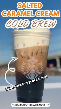 a cup of cold coffee sitting on top of a table with the words salted caramel cream cold brew