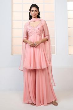 Peach peplum kurta with resham, beads and sequin floral pattern embroidery. Comes with sharara and scatter embroidered dupatta. - Aza Fashions Bollywood Style Sharara With Sheer Dupatta And Peplum, Designer Peplum Salwar Kameez For Eid, Designer Eid Anarkali Set With Peplum Shape, Peplum Salwar Kameez For Eid, Semi-stitched Peplum Palazzo Set For Wedding, Pink Chinon Sharara For Wedding, Traditional Peplum Dress With Sheer Dupatta, Fitted Peplum Palazzo Set For Eid, Designer Peplum Sharara With Dupatta