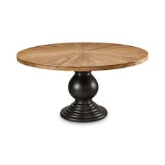 a round wooden table with an iron base