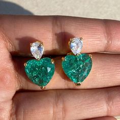 Paraiba Tourmaline Earrings features semi precious green stone and cz diamonds in heart shape. Ideal to pair with your design outfits and bridal wedding gown. These LUXURY Statement Green Pariba Tourmaline Earrings surely elevate your look. Perfect Gift For her. *𝐏𝐑𝐎𝐃𝐔𝐂𝐓 𝐃𝐄𝐓𝐀𝐈𝐋* * 𝐌𝐚𝐭𝐞𝐫𝐢𝐚𝐥: Brass * 𝐏𝐥𝐚𝐭𝐢𝐧𝐠: White Rhodium Plated * 𝐒𝐭𝐨𝐧𝐞: AAA-quality CZ yellow diamond & Paraiba Tourmaline. 𝐕𝐢𝐬𝐢𝐭 𝐎𝐮𝐫 𝐅𝐀𝐐𝐬 𝐟𝐨𝐫 𝐒𝐡𝐢𝐩𝐩𝐢𝐧𝐠 𝐏𝐨𝐥𝐢𝐜𝐢𝐞𝐬 𝐚𝐧𝐝 ? Luxury Unique Tourmaline Jewelry, Formal Green Heart-shaped Earrings, Green Cubic Zirconia Heart Cut Jewelry, Heart-shaped Green Jewelry With Matching Earrings, Green Emerald Heart Cut Jewelry, Green Double Heart Jewelry For Anniversary, Heart Cut Emerald Green Jewelry, Green Heart Cut Jewelry For Wedding, Elegant Green Heart Cut Earrings