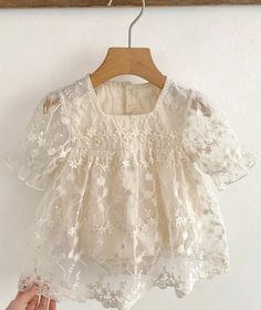 This beautiful dress is perfect for any occasion, whether it's a party, wedding, christening, or just a casual day out. The intricate flower embroidery and lace detailing add a touch of elegance and charm to the dress.  These dresses are MADE to ORDER. so please allow 3 weeks for arrival! The puff sleeves provide a comfortable fit for the baby and the tulle fabric gives the dress a playful and whimsical look. The dress is suitable for infants and toddlers aged 0-3, 3-6 or 6-9 months and comes in Garden Party Tulle Dress With Lace Patchwork, Fitted Lace Dress For Dress-up In Spring, Fitted Lace Patchwork Dress For Dress-up, Spring Dress-up Dresses With Lace Patchwork, Spring Dresses With Lace Patchwork For Dress-up, Elegant Lace Organza Dress For Spring, Lace Dress With Floral Applique For Dress-up, Spring Lace Dress With Lace Top, Lace Dress With Lace Sleeves For Dress-up