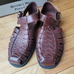 Beverly Hills Polo Club Men's Sandals Size 10, Color Is Cognac (Brown), Covered Front With Straps And Buckles, Upper Material Is Leather And Balance Is Man Made Material, Nwt, New In Original Box, Never Worn Except In House To See If Fit Was Right. Summer Brown Leather Slip-on Shoes, Brown Flat Leather Shoes For Summer, Brown Leather Closed-toe Shoes For Summer, Casual Brown Leather Summer Shoes, Brown Leather Shoes For Summer, Summer Flat Leather Shoes With Leather Footbed, Brown Leather Shoes With Rubber Sole For Summer, Brown Leather Open Toe Shoes With Branded Insole, Summer Synthetic Leather Shoes With Rubber Sole