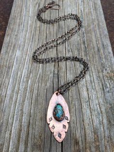 This copper feather pendant features a stunning old stock (1970's) natural Kingman turquoise (or any stone of your choice) highlighted with an organic, tribal stamped design.  The copper has been oxidized for a rustic, aged look.  This necklace features an extra long, solid copper chain and looks great worn alone or layered with other necklaces.  The necklace in the photos has sold but I can recreate this for you using any stone.  I have lots of turquoise in stock also; including some of the 197 Bohemian Hand Forged Turquoise Necklace, Bohemian Turquoise Pendant Necklace With Patina, Bohemian Turquoise Oval Pendant For Jewelry Making, Bohemian Turquoise Oval Pendant Necklace, Bohemian Engraved Turquoise Necklaces, Bohemian Copper Necklace With Patina, Bohemian Engraved Copper Necklaces, Bohemian Teardrop Pendant Necklace, Hand Forged, Bohemian Stamped Jewelry For Jewelry Making