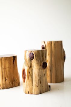 three pieces of wood sitting on top of each other