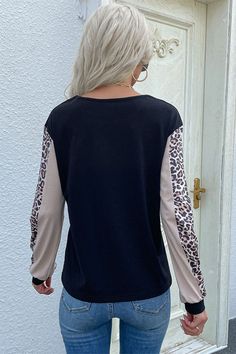 Pattern: Leopard/color block Features: Long sleeves, ribbed cuff Neckline: Round neck Stretch: Slightly stretchy Product measurements: S: bust 37 in, length 24 in, sleeve 22 in, shoulder 18 inM: bust 39 in, length 24 in, sleeve 22 in, shoulder 19 inL: bust 41 in, length 25 in, sleeve 23 in, shoulder 19 inXL: bust 44 in, length 25 in, sleeve 23 in, shoulder 20 in Material composition: 65% polyester, 35% cotton Care: Machine wash cold. Tumble dry low. Imported Two Piece Set Pants, Color Block Sweatshirt, Wholesale Shirts, Neck Stretches, Causual Outfits, Long Sleeve Sweatshirt, Winter Wear, Stripe Print, Long Sleeve Sweatshirts