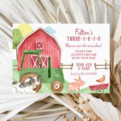 a farm themed baby shower is shown with an animal on the tractor and barn in the background