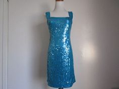 "This is a Stunning Vintage by Designer NITELINE Blue Green Teal Mermaid Sequin Square Neckline Sleeveless Evening Party Dress Size 8 S-M All measurements are approximate: Armpit to armpit 16\" length 36\" ( from shoulder to hem) This fabulous mini dress is in very good vintage condition with very little sign of wear, and ready to wear. Material: 100% Polyester, Sequins For more beautiful and fabulous of vintage Dresses Handbags and Accessories please see our \"Handbags Accessories clothing\" Sh Fitted Sleeveless Mermaid Dress, Sleeveless Summer Mermaid Prom Dress, Sleeveless Fitted Mermaid Party Dress, Blue Sequined Mermaid Dress For Night Out, Light Blue Fitted Sleeveless Party Dress, Fitted Light Blue Sleeveless Party Dress, Fitted Light Blue Sleeveless Dress For Party, Blue Mermaid Evening Dress For Summer, Blue Mermaid Dress For Party Season