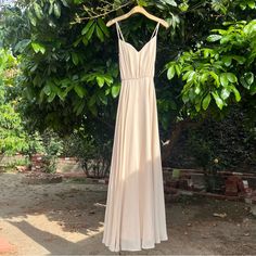 Double Lined, Size 6. Has Adjustable Straps. In Good Condition, There Are Spots Throughout Bottom Hem And Some Areas Near Hem. Just Needs A Good Wash. Selling As Is. Bust: 16” Waist: 12.5” Length: 59” Approximately Sleeveless Apricot Maxi Dress For Party, Peach Sleeveless Dresses For Wedding, Sleeveless Peach Wedding Dress, Peach Sleeveless Wedding Dresses, Peach Sleeveless Prom Dress, Sleeveless Beige Maxi Dress For Prom, Floor-length Beige Gown For Bridesmaid, Floor-length Beige Bridesmaid Gown, Beige Floor-length Gown For Bridesmaid