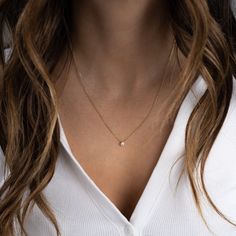 Super dainty necklace for a minimalist look! Great for stacking! 925 Sterling Silver Available in 14k Gold or Rhodium (we use a thick plating for a piece that will last you years to come!) 3x4mm Pendant 16" + 3" Extension Chain Lobster Clasp Closure Nickel-free & Hypoallergenic Highest Grade CZ for an authentic diamond look! Delicate White Diamond Necklace For Everyday, Dainty Diamond Necklace With Adjustable Chain For Everyday, Minimalist Tiny Charm Necklaces For Anniversary, White Diamond Necklace With Delicate Chain, Minimalist Style, Everyday Birthstone Necklace With Delicate 14k Gold Chain, Minimalist White Diamond Necklace With Delicate Chain, Tiny Minimalist Charm Necklace For Anniversary, Minimalist Tiny Charm Necklace For Anniversary, Delicate Diamond Necklace With Adjustable Chain For Everyday