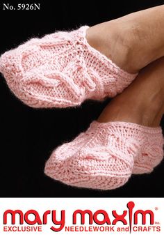 there is a woman's feet wearing pink knitted slippers with the words mary maximum on it