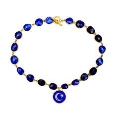 Handcrafted vintage Lapis Lazuli necklace, a gorgeous blue enamel round pendant with a moon and star in gold vermeil, vintage toggle clasp. Wear it alone or layered with other necklaces from our collection as shown in images. Lapis lazuli is one of the oldest opaque gemstones in history--more than 6,500 years! This deep blue stone includes tiny flecks of mica, like a night sky full of stars. With a name that dances on the tongue, rich history with royalty and artists, and a shimmering deep blue Blue Crescent Gemstone Jewelry, Celestial Blue Cabochon Jewelry, Blue Celestial Cabochon Jewelry, Celestial Style Blue Cabochon Jewelry, Celestial Pendant Necklace With Natural Stones, Celestial Style Pendant Necklace With Natural Stones, Vintage Lapis Lazuli Round Jewelry, Blue Moon Charm Pendant Necklace, Artisan Moon Charm Pendant Necklace