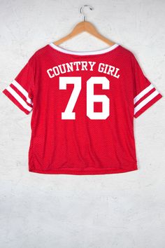 Country Girl Store - Women's Country Girl® Meshy Burnout Cropped V-Neck Tee, $33.95 (http://www.countrygirlstore.com/womens/short-sleeve-tees/country-girl-meshy-burnout-cropped-v-neck-tee/) Graphic Tee T-shirt For Cheerleading, Red Short Sleeve Top For Cheerleading, Trendy Red T-shirt For College, Sporty Graphic Print T-shirt For Cheerleading, Graphic Tee T-shirt With Team Name For Summer, Summer Graphic Tee With Team Name, Short Sleeve T-shirt For Summer Cheerleading, Summer Short Sleeve T-shirt For Cheerleading, Red Sublimation Print Top For College