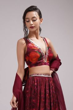 Deep wine, multicolor pleated attached cancan lehenga with floral print and embroidered waistband. Paired with sleeveless embroidered padded blouse and dupatta. - Aza Fashions Fitted Multicolor Choli For Party Wear, Diwali Party V-neck Sets, Fitted Multicolor Anarkali Set For Party, Party Wear V-neck Sets With Sheer Dupatta, Silk V-neck Party Sets, Multicolor Semi-stitched Palazzo Set For Party, V-neck Navratri Party Sets, Fitted Multicolor Pre-draped Saree For Party, Navratri Party V-neck Sets