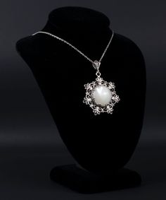 "This beautifully handcrafted filigree art daisy flower pendant feature with Mother of Pearl, Rose Quartz, Blue Abalone or Amethyst gemstones. Exquisitely crafted, handmade flower pendant necklace would be your perfect option for anniversary, birthday, thanksgiving or Christmas gift for yourself or loved one.  For gold plated option, visit that link; https://www.etsy.com/FiligranUSA/listing/1401924202 The optional silver chain length is 18.00\" (45.7 cm)  + 2.00\" (5.10 cm) extension.  All gemstones` diameter is 16 mm, cabochon round-cut.  This metal embroidery filigree pendant is oxidized and highly polished. Comes with a velvet pouch, silver polish cloth and a luxurious gift box. What is Filigree Art? Filigree is made of delicate metal strands that have been skillfully fashioned to creat Elegant Oval Filigree Necklace, Exquisite Oval Necklace With Intricate Design, Oval Pendant Filigree Jewelry For Anniversary, Elegant Jewelry With Large Oval Pendant, Spiritual Sterling Silver Jewelry With Pearl Pendant, Anniversary Filigree Oval Pendant Jewelry, Anniversary Oval Pendant Filigree Jewelry, Fine Jewelry Wedding Necklace With Cabochon, Exquisite Wedding Necklaces With Cabochon