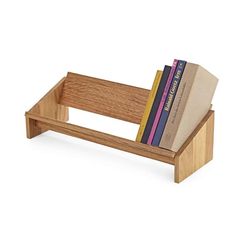 a wooden book stand with books on it